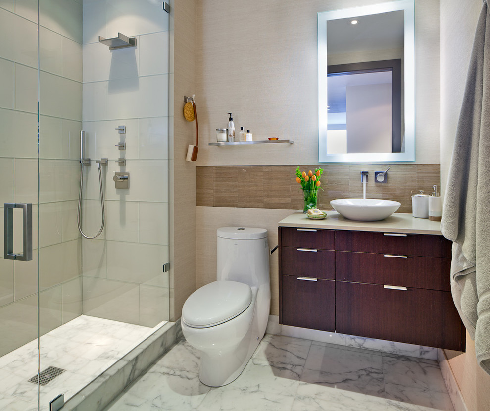 Example of a mid-sized trendy master bathroom design in San Francisco with flat-panel cabinets, dark wood cabinets and marble countertops