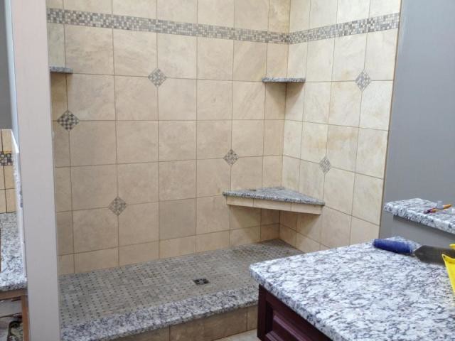 Design ideas for a classic bathroom in Bridgeport with porcelain tiles.