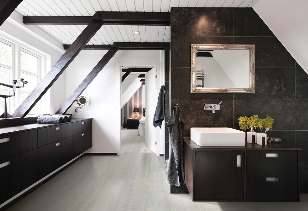 Example of a trendy master black tile beige floor bathroom design in Nashville with flat-panel cabinets, dark wood cabinets, white walls, a vessel sink, wood countertops and brown countertops