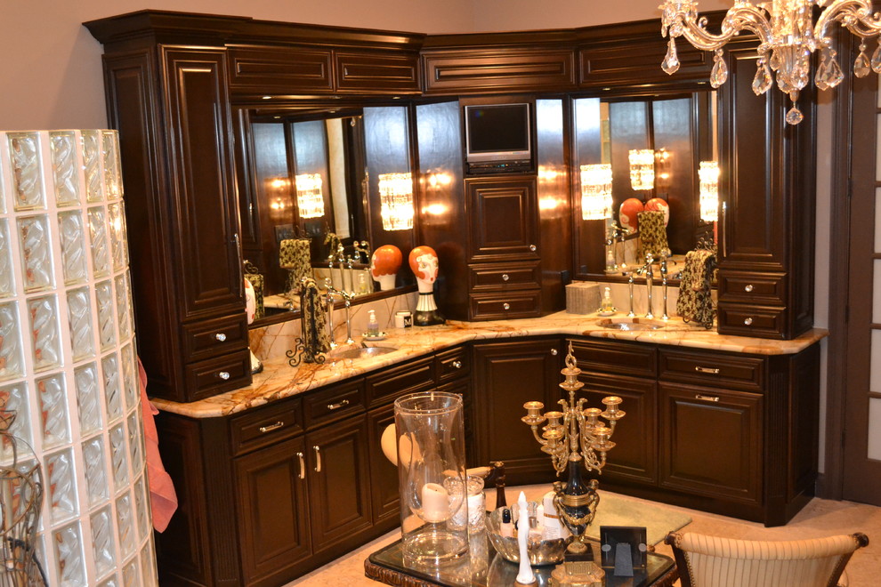 Example of a large classic master bathroom design in Orlando with raised-panel cabinets, dark wood cabinets and an undermount sink