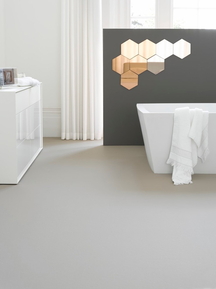 Design ideas for a contemporary bathroom in London with vinyl flooring.