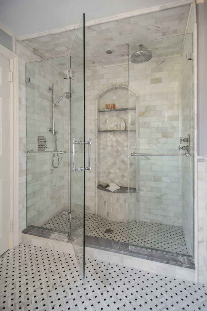 Example of a mid-sized classic master gray tile and marble tile marble floor and gray floor double shower design in Newark with furniture-like cabinets, white cabinets, a two-piece toilet, gray walls, an undermount sink, marble countertops, a hinged shower door and gray countertops