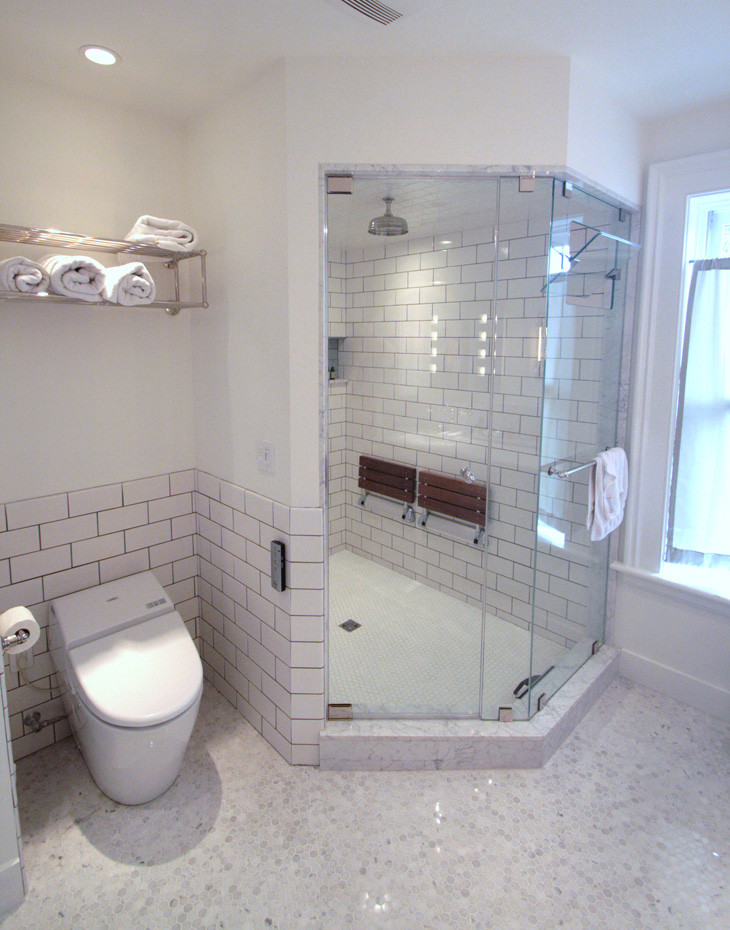 Large minimalist master white tile and ceramic tile marble floor alcove shower photo in Bridgeport with an undermount sink, shaker cabinets, marble countertops, a one-piece toilet and white walls