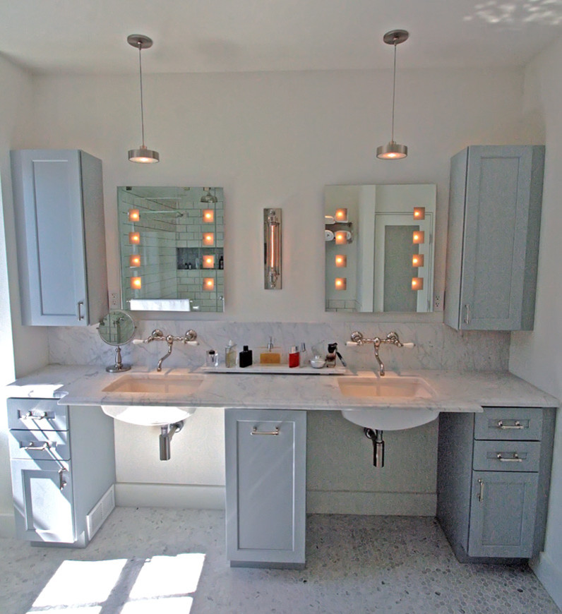 Inspiration for a large modern master white tile and ceramic tile marble floor alcove shower remodel in Bridgeport with an undermount sink, shaker cabinets, blue cabinets, marble countertops, a one-piece toilet and white walls