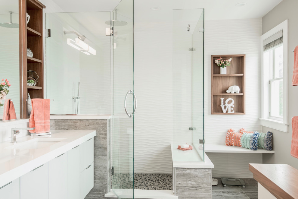Medium sized contemporary ensuite bathroom in Bridgeport with flat-panel cabinets, grey cabinets, a corner shower, a one-piece toilet, white tiles, ceramic tiles, beige walls, ceramic flooring, a submerged sink, engineered stone worktops, beige floors, a hinged door and white worktops.