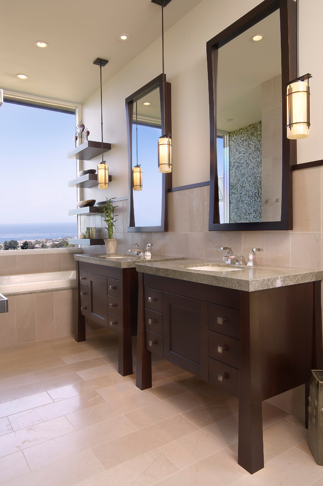 Drop-in bathtub - mid-sized coastal master blue tile, green tile and mosaic tile porcelain tile and beige floor drop-in bathtub idea in San Diego with dark wood cabinets, furniture-like cabinets, beige walls, an undermount sink and granite countertops