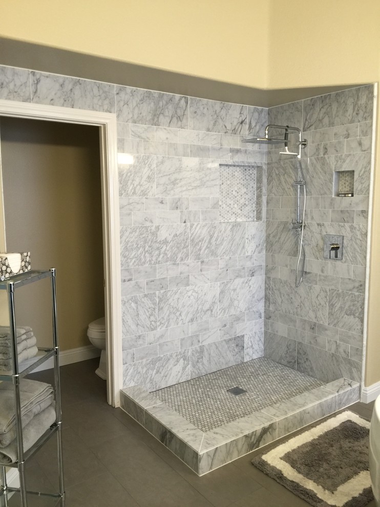 Photo of a large classic bathroom in Las Vegas with a walk-in shower, grey tiles, stone tiles and beige walls.