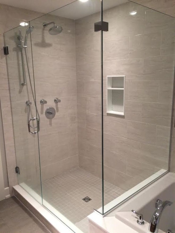 Large contemporary ensuite bathroom in Ottawa with flat-panel cabinets, grey cabinets, an alcove bath, a corner shower, grey tiles, grey walls, light hardwood flooring, a pedestal sink, concrete worktops, porcelain tiles, beige floors and a hinged door.