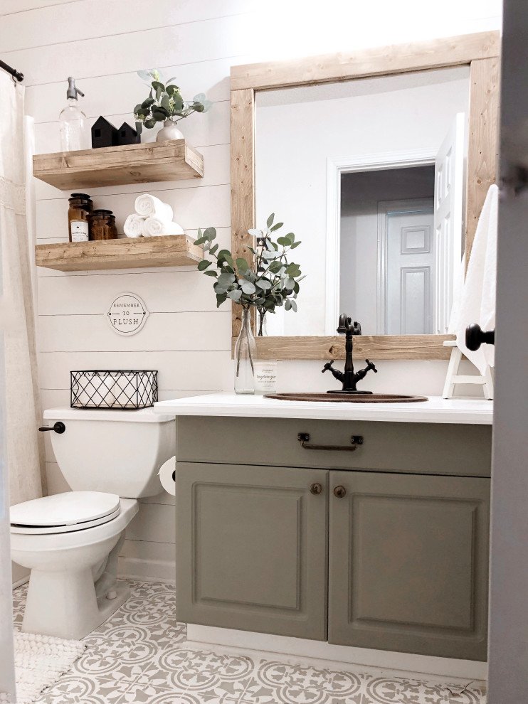 Example of a farmhouse single-sink and shiplap wall bathroom design in Los Angeles with a one-piece toilet and a drop-in sink