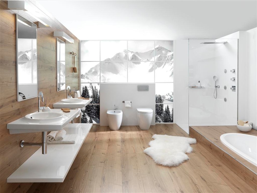 Inspiration for a large contemporary ensuite bathroom in Los Angeles with a built-in bath, a corner shower, a one-piece toilet, ceramic tiles, white walls, medium hardwood flooring, a console sink, brown floors, an open shower and white worktops.