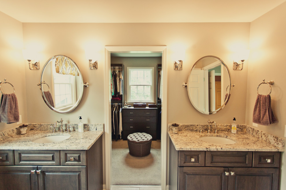Example of a large classic master white tile and subway tile medium tone wood floor bathroom design in Cincinnati with an undermount sink, raised-panel cabinets, gray cabinets, granite countertops, beige walls and a two-piece toilet