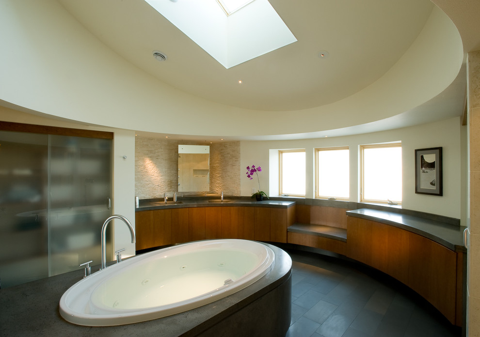 Contemporary bathroom in Other with concrete worktops.