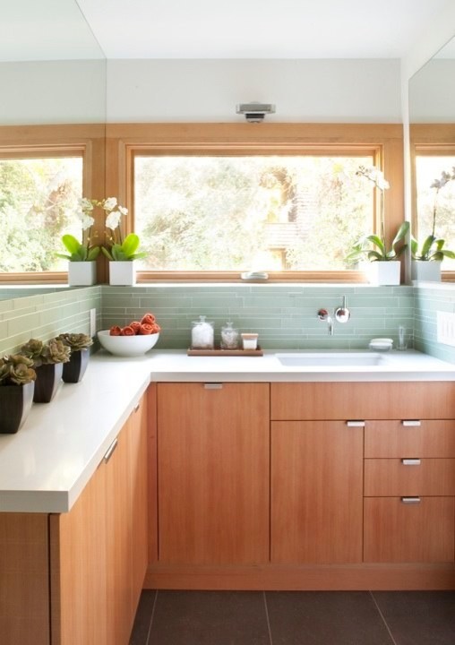 Inspiration for a modern master green tile and glass tile slate floor and gray floor tub/shower combo remodel in San Francisco with flat-panel cabinets, medium tone wood cabinets, an undermount tub, green walls, an undermount sink, quartz countertops, a hinged shower door and white countertops