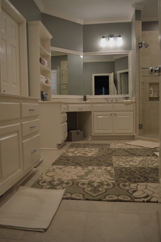 This is an example of a medium sized traditional bathroom in Atlanta with a built-in sink, flat-panel cabinets, white cabinets, granite worktops, a built-in bath, a corner shower, white tiles, ceramic tiles, grey walls and ceramic flooring.