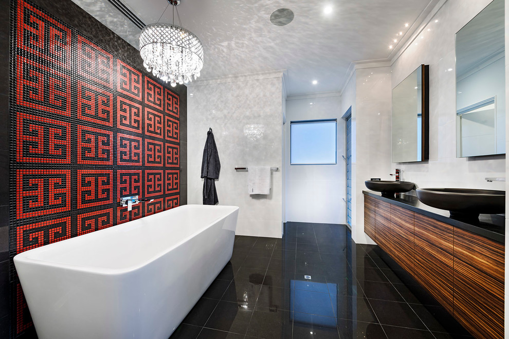 Источник вдохновения для домашнего уюта: главная ванная комната в современном стиле с настольной раковиной, плоскими фасадами, фасадами цвета дерева среднего тона, отдельно стоящей ванной, красной плиткой, плиткой мозаикой и белыми стенами