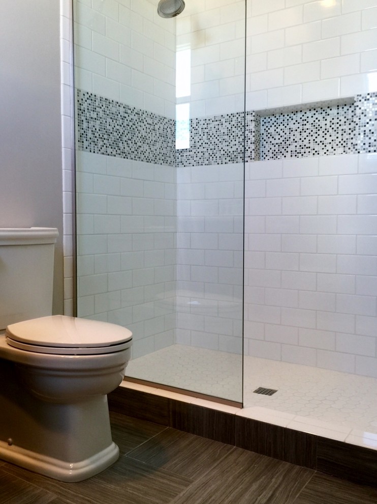 Example of a mid-sized trendy 3/4 white tile and ceramic tile porcelain tile alcove shower design in Miami with a one-piece toilet and white walls