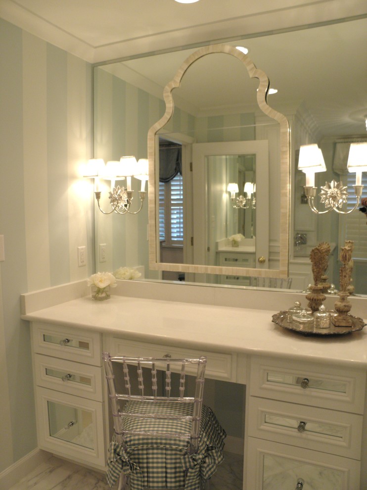 Elegant master marble floor bathroom photo in Charlotte with recessed-panel cabinets, white cabinets and quartzite countertops