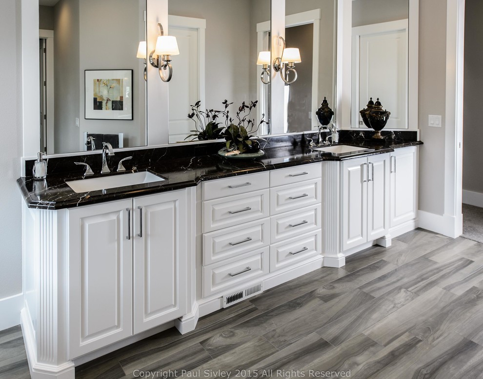 Inspiration for a large timeless master bathroom remodel in Portland with an undermount sink, recessed-panel cabinets, white cabinets and beige walls