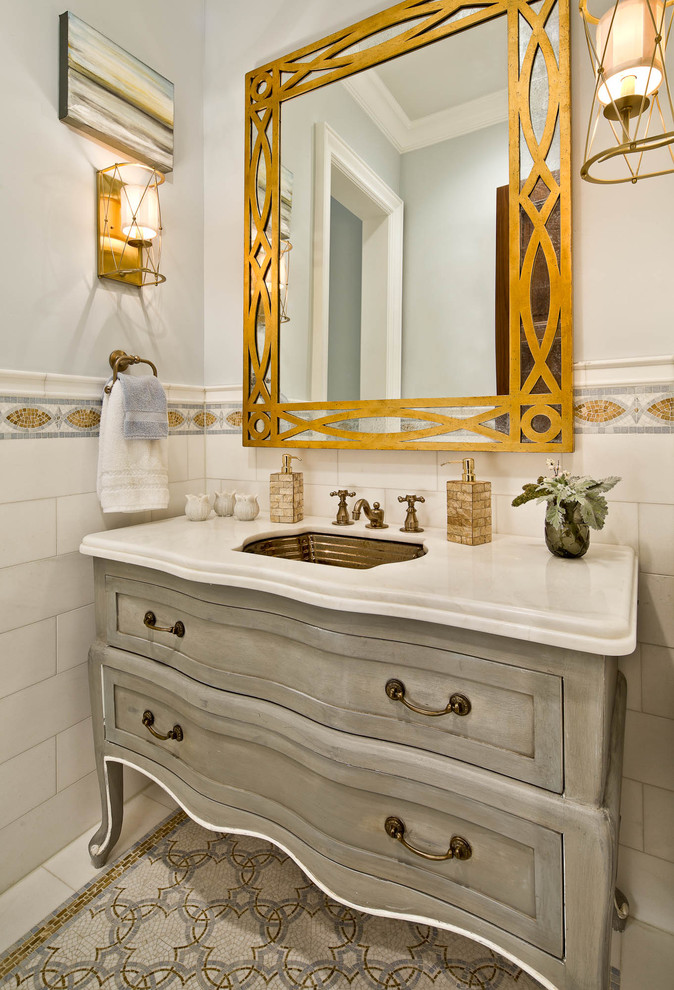 Example of a classic bathroom design in Dallas with marble countertops