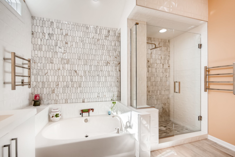 Mid-sized minimalist master gray tile and marble tile light wood floor and brown floor bathroom photo in Chicago with orange walls and a hinged shower door