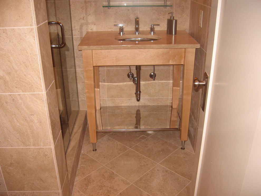 Photo of a small rural bathroom in Detroit with a submerged sink, light wood cabinets, marble worktops, a corner shower, ceramic tiles and ceramic flooring.