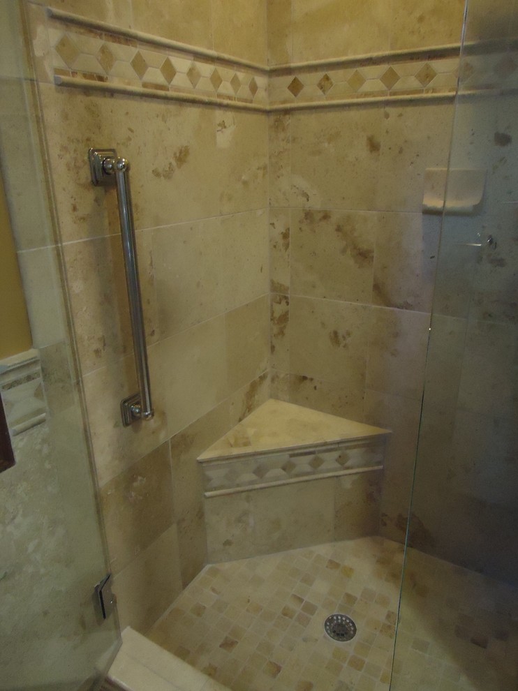 Example of a small country stone tile travertine floor bathroom design in Detroit
