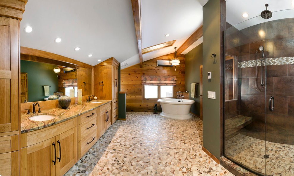 Bathroom - large rustic master multicolored tile and stone tile mosaic tile floor bathroom idea in Other with recessed-panel cabinets, light wood cabinets, green walls, an undermount sink and granite countertops