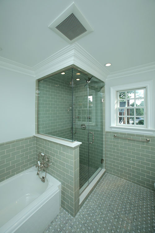 Example of a mid-sized transitional kids' green tile and subway tile mosaic tile floor bathroom design in New York with shaker cabinets, white cabinets, marble countertops, a two-piece toilet, an undermount sink and white walls