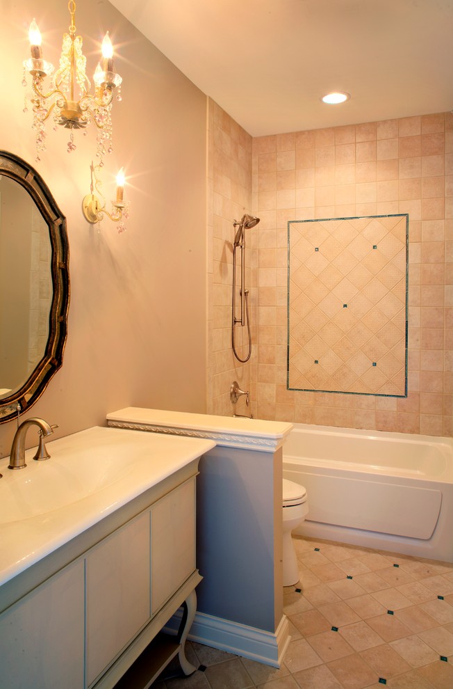 Example of a small classic kids' beige tile and porcelain tile porcelain tile alcove shower design in Chicago with furniture-like cabinets, light wood cabinets, a hot tub, a two-piece toilet, beige walls, an integrated sink and solid surface countertops