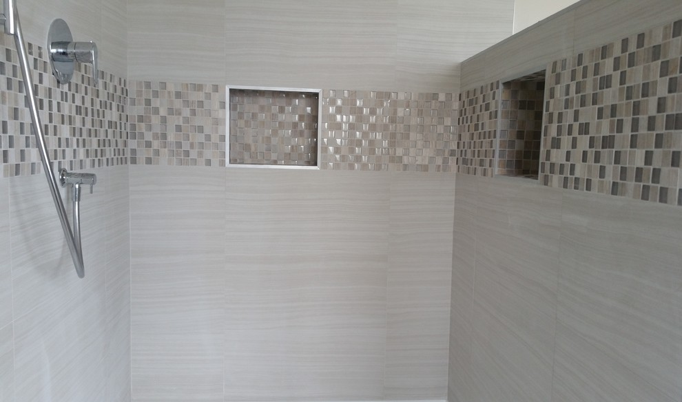 Example of a trendy master beige tile and porcelain tile bathroom design in Vancouver with beige walls