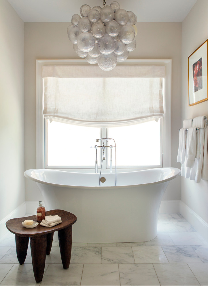 Design ideas for a traditional bathroom in Dallas with a freestanding bath.