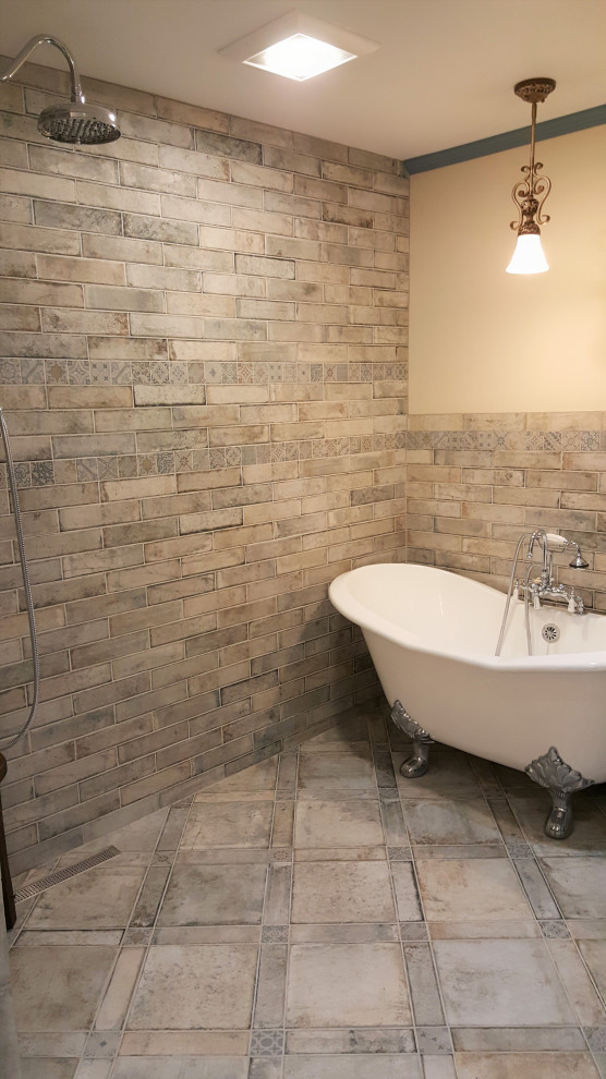 Inspiration for a medium sized classic ensuite bathroom in Bridgeport with a claw-foot bath, a walk-in shower, a bidet, multi-coloured tiles, porcelain tiles, beige walls, porcelain flooring, multi-coloured floors and an open shower.