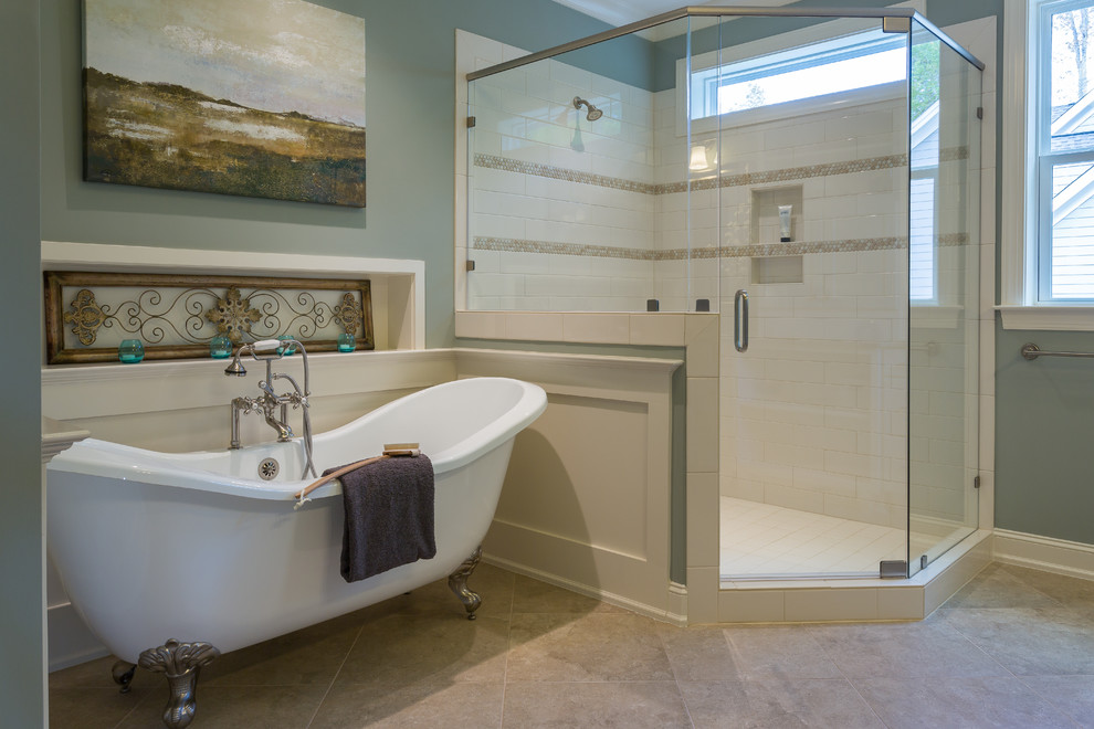 Photo of a medium sized traditional ensuite bathroom in Raleigh with a freestanding bath, a corner shower, white tiles, porcelain tiles, blue walls and porcelain flooring.