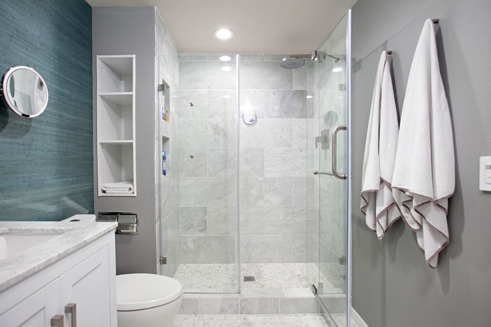 Photo of a medium sized classic shower room bathroom in San Diego with shaker cabinets, white cabinets, an alcove shower, a two-piece toilet, grey tiles, marble tiles, grey walls, marble flooring, a submerged sink, granite worktops, grey floors, a hinged door and grey worktops.