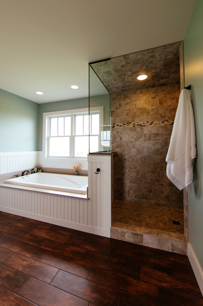 Design ideas for a classic ensuite bathroom in Indianapolis with shaker cabinets, a hot tub, a corner shower, green walls, medium hardwood flooring, a submerged sink and quartz worktops.