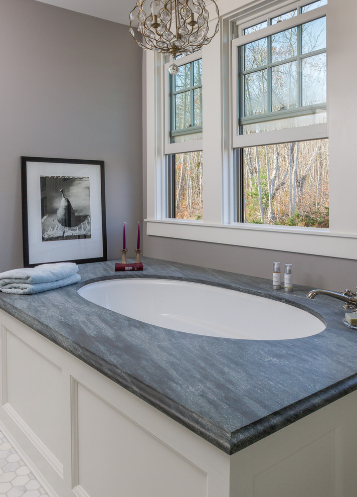 Design ideas for a large traditional ensuite bathroom in Portland Maine with beaded cabinets, white cabinets, a submerged bath, white tiles, marble tiles, grey walls, marble flooring, a submerged sink and marble worktops.