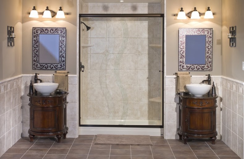 Imagen de cuarto de baño moderno con armarios tipo mueble, puertas de armario de madera en tonos medios, ducha empotrada, paredes beige, lavabo sobreencimera y encimera de granito