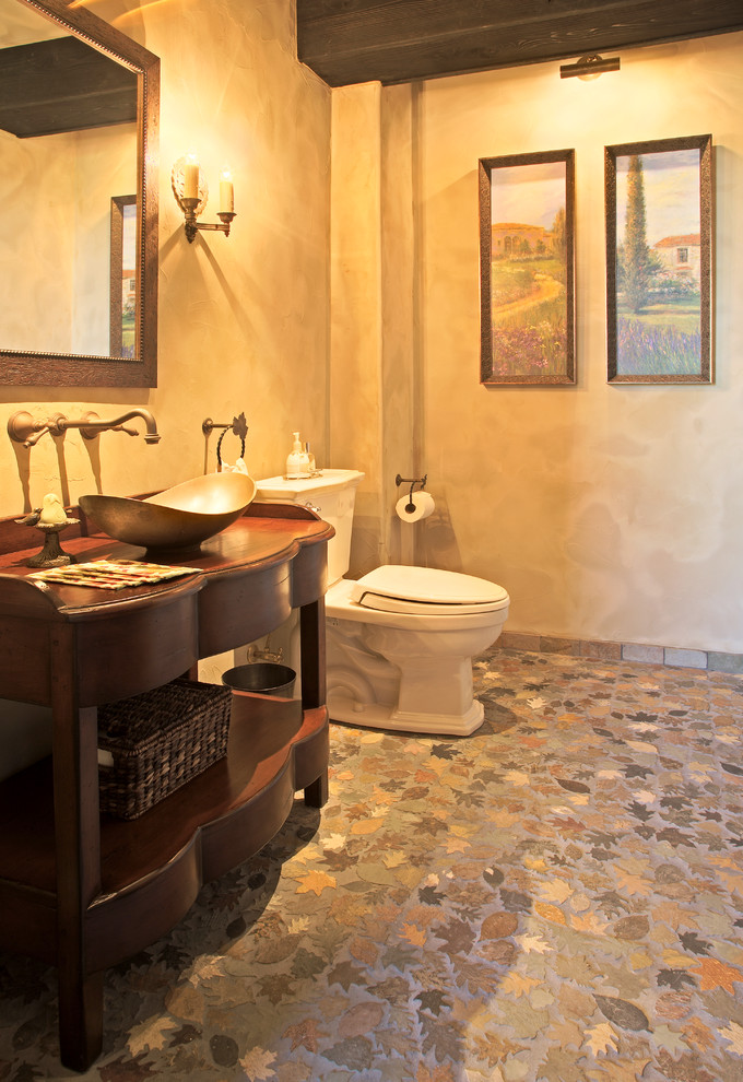 Idee per un'ampia stanza da bagno con doccia rustica con consolle stile comò, ante in legno bruno, piastrelle multicolore, piastrelle di cemento, lavabo a bacinella e top in legno