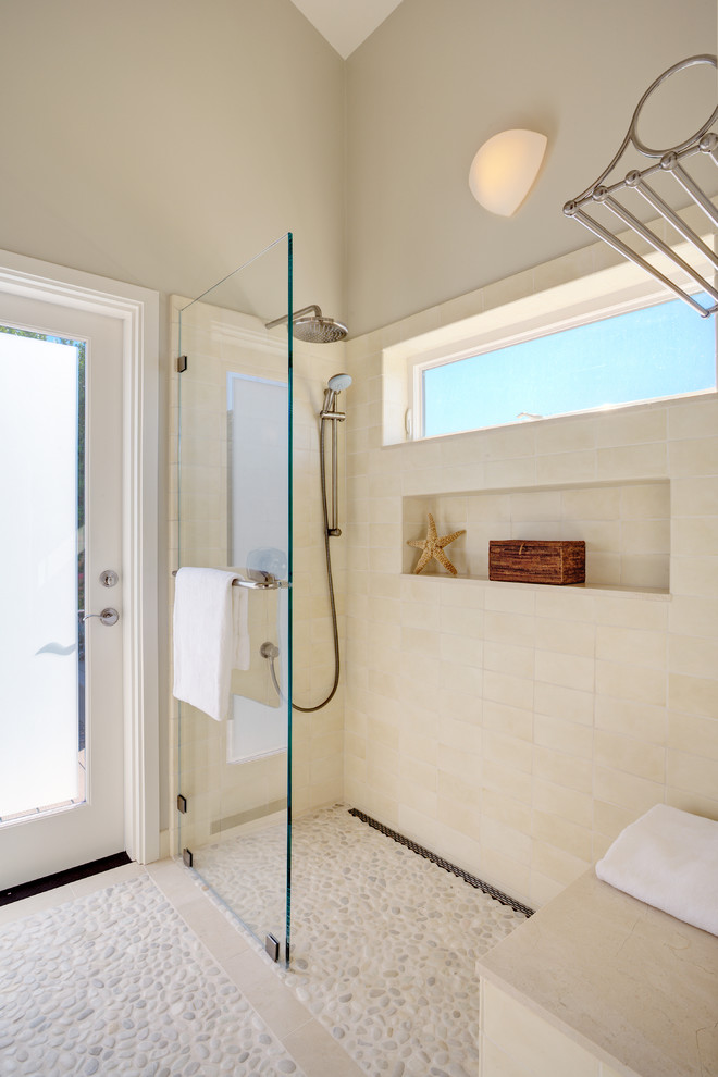 Inspiration for a medium sized coastal ensuite bathroom in San Francisco with shaker cabinets, white cabinets, a built-in shower, a one-piece toilet, white tiles, ceramic tiles, white walls, pebble tile flooring, a submerged sink and marble worktops.