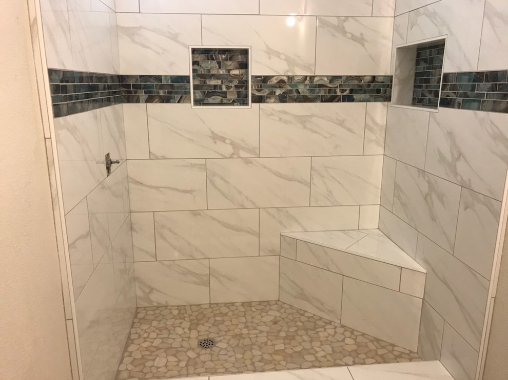 Photo of a medium sized beach style ensuite bathroom in Sacramento with a walk-in shower, white tiles, porcelain tiles and a sliding door.