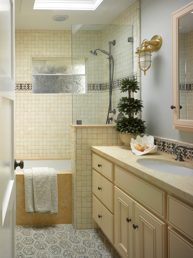 Example of a beach style beige tile bathroom design in San Francisco