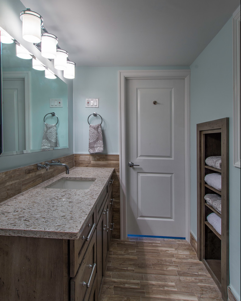 Large classic family bathroom in Tampa with shaker cabinets, grey cabinets, a walk-in shower, a two-piece toilet, multi-coloured tiles, porcelain tiles, green walls, porcelain flooring, a submerged sink and engineered stone worktops.