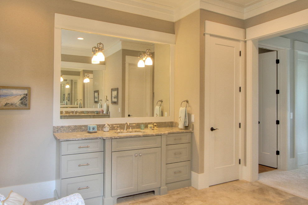 Example of a transitional master beige tile and stone tile travertine floor doorless shower design in Other with an undermount sink, beaded inset cabinets, gray cabinets and marble countertops
