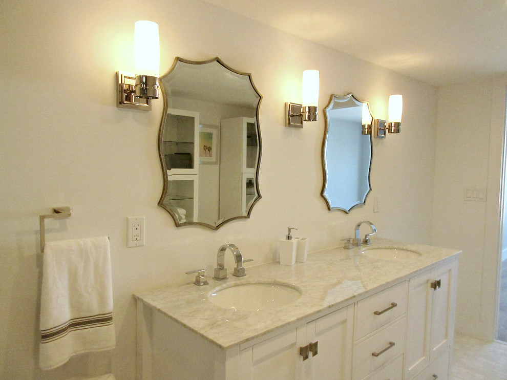 Example of a mid-sized transitional master gray tile and glass tile marble floor double shower design in Miami with shaker cabinets, white cabinets, a one-piece toilet, white walls, an undermount sink and marble countertops