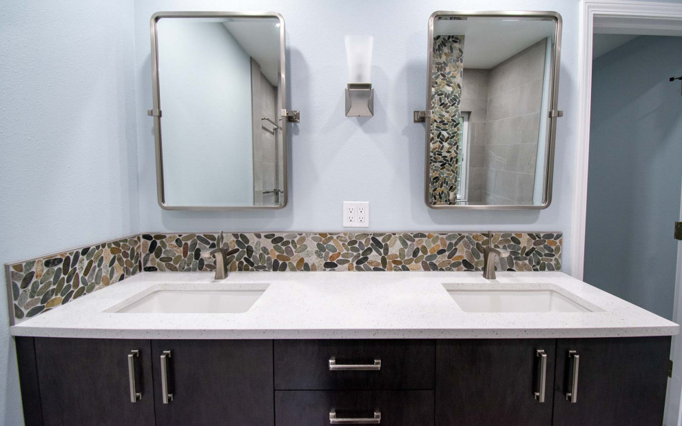 Large beach style master gray tile and ceramic tile ceramic tile, gray floor and double-sink bathroom photo in Portland with flat-panel cabinets, black cabinets, a two-piece toilet, blue walls, an undermount sink, quartz countertops, white countertops, a niche and a built-in vanity