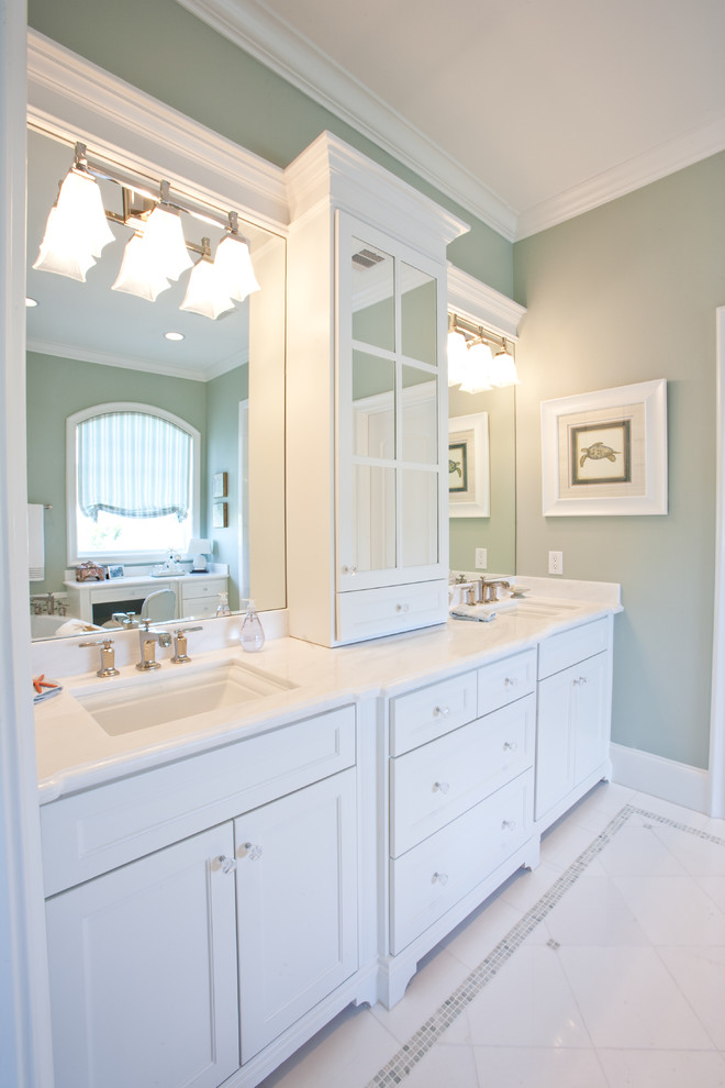 Inspiration for a large coastal 3/4 white tile and porcelain tile porcelain tile bathroom remodel in Houston with an undermount sink, shaker cabinets, white cabinets and green walls