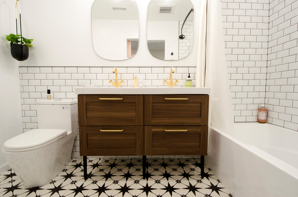 Bathroom - mid-sized contemporary master white tile and ceramic tile cement tile floor and white floor bathroom idea in Toronto with shaker cabinets, medium tone wood cabinets, a one-piece toilet, white walls, an integrated sink, solid surface countertops and white countertops