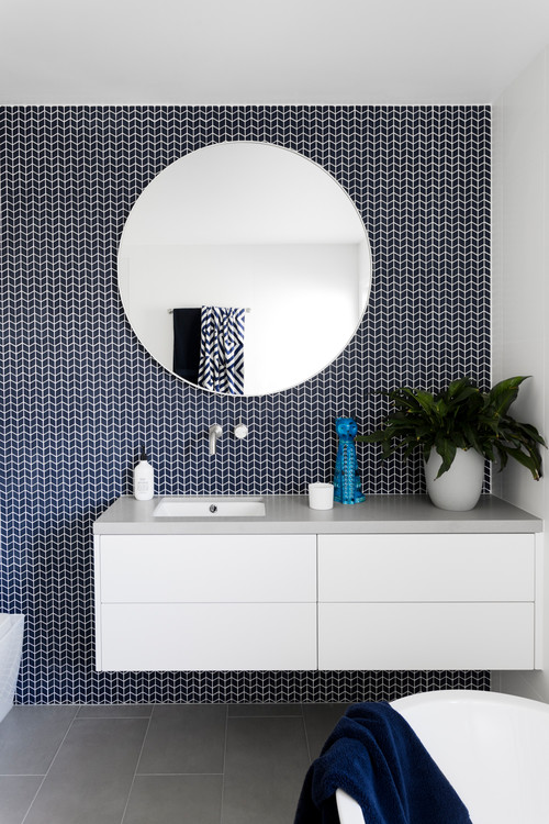 Modern Contrast: Navy Blue Mosaic Backsplash with White Accents