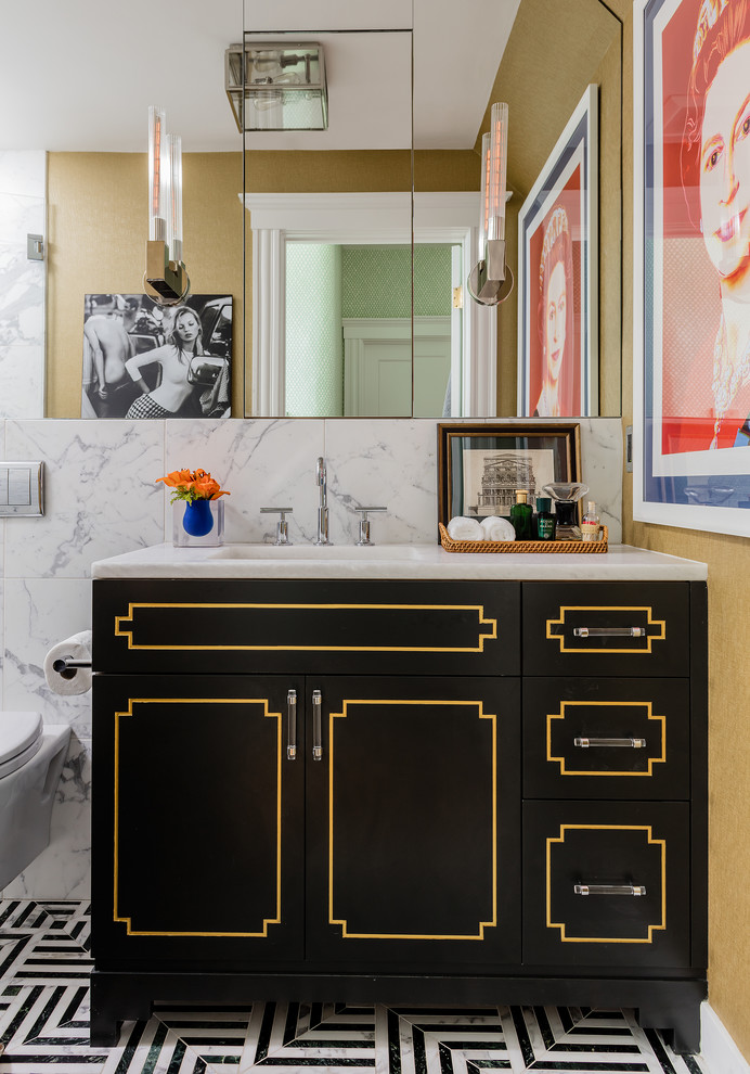 Classic bathroom in Denver with black cabinets, yellow walls and an integrated sink.