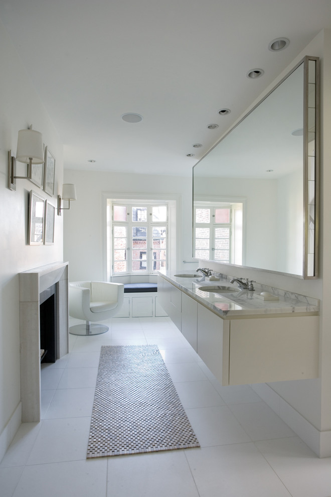 Inspiration for a modern bathroom remodel in Boston with marble countertops